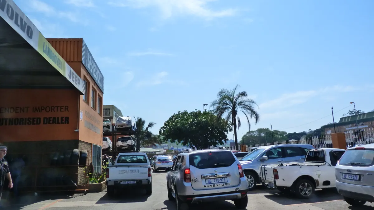 The SparesBoyz yard in Briardene with Land Rover among the makes on the building fascia, and cars on Durban number plates